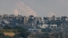 Edificios en ruinas en la Franja de Gaza, en medio del conflicto en curso entre Israel y el grupo islamista palestino Hamas, visto desde Israel, el 2 de enero de 2024. REUTERS/Amir Cohen