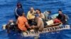 Balseros cubanos repatriados por la Guardia Costera.