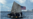 Balseros cubanos con bandera de EEUU