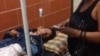Leticia Ramos fue hospitalizada tras recibir una golpiza por parte de la policía. Fotos tomadas de Facebook