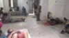 Miembros del Movimiento San Isidro en huega de hambre descansan sobre el suelo en La Habana Vieja.