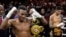 El cubano Erislandy Lara celebra tras derrotar a Michael Zerafa, de Australia, en una pelea por el título de peso mediano, el sábado 30 de marzo de 2024, en Las Vegas. (Foto AP/John Locher)