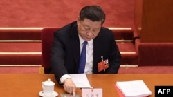 Xi Jinping, presidente de la República Popular China. (Photo by NICOLAS ASFOURI / AFP).