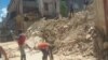 Los escombros cubren la calle Habana en esta imagen tomada de uno de los videos que circulan en redes sociales.